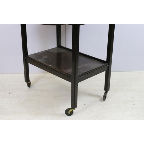 578 - Drop leaf side table with lower shelf, on square legs with castors, H 71cm, W 63cm D 36cm (not exten... 