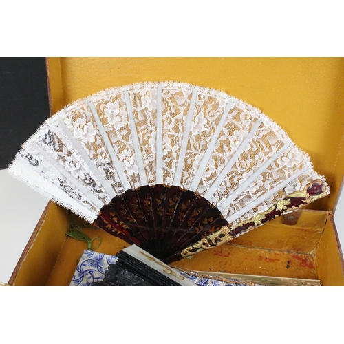 303 - Collection of fans, to include a mother of pearl example, with hand-painted lace work, all contained... 