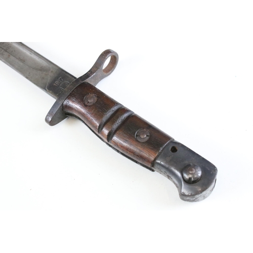 309 - WWI American Winchester bayonet and leather scabbard and frog