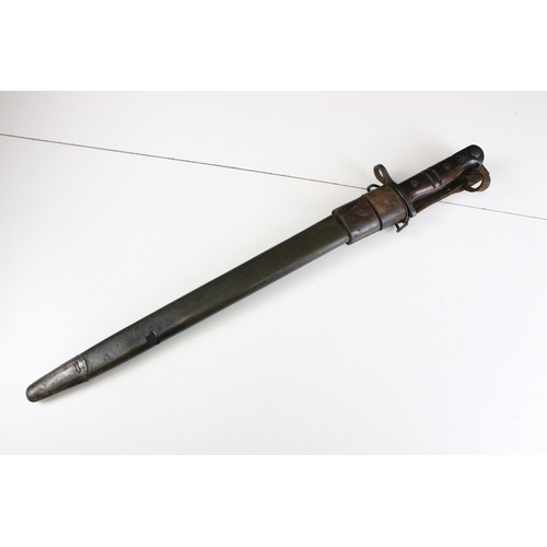 309 - WWI American Winchester bayonet and leather scabbard and frog