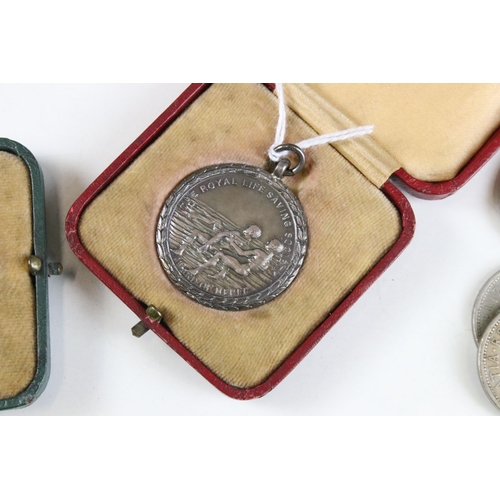 315 - Assorted collectables to include a silver Royal Life Saving Society medal, a bronze example,  two cl... 