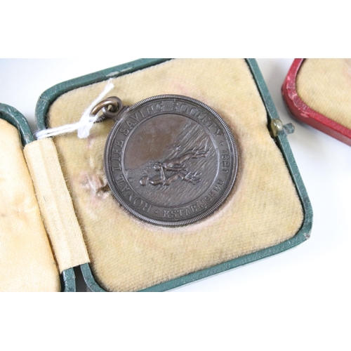 315 - Assorted collectables to include a silver Royal Life Saving Society medal, a bronze example,  two cl... 