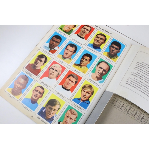 322 - Two Football sticker / stamp albums to include 1969-1970 and 1970-1971, both complete, together with... 