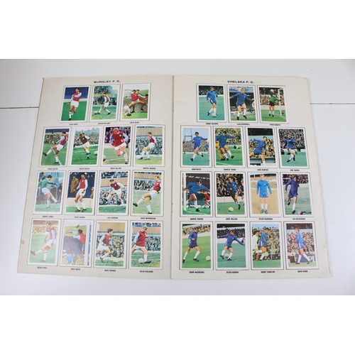 322 - Two Football sticker / stamp albums to include 1969-1970 and 1970-1971, both complete, together with... 