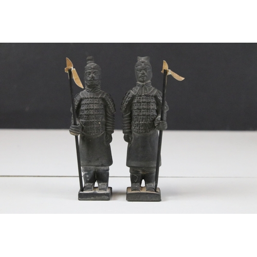 325 - Collection of black ceramic Chinese army figurines together with a cast brass Emporer figurine, moth... 