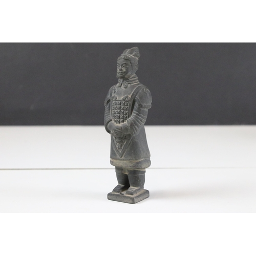 325 - Collection of black ceramic Chinese army figurines together with a cast brass Emporer figurine, moth... 