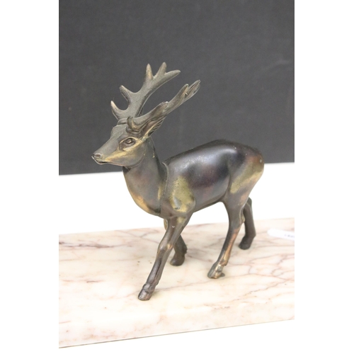 123 - Two Art Deco cast metal deer on marble base plinth, H 25cm, W 50cm, D12cm