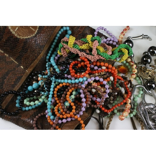 289 - Collection of costume jewellery to include beaded necklaces, embroidered brooches, turquoise earring... 