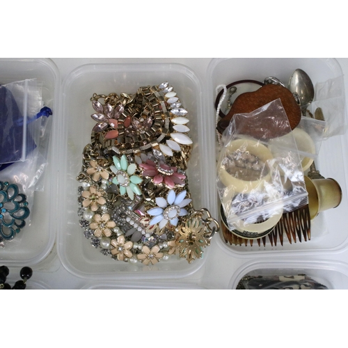 295 - Large collection of costume jewellery to include silver plate spoons. vintage badges, beaded necklac... 