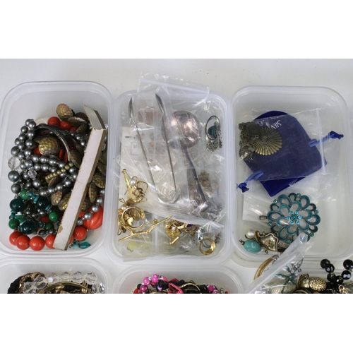 295 - Large collection of costume jewellery to include silver plate spoons. vintage badges, beaded necklac... 