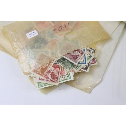 374 - Collection of assorted world stamps to include loose world kilo ware, GB stamps on mounting cards in... 