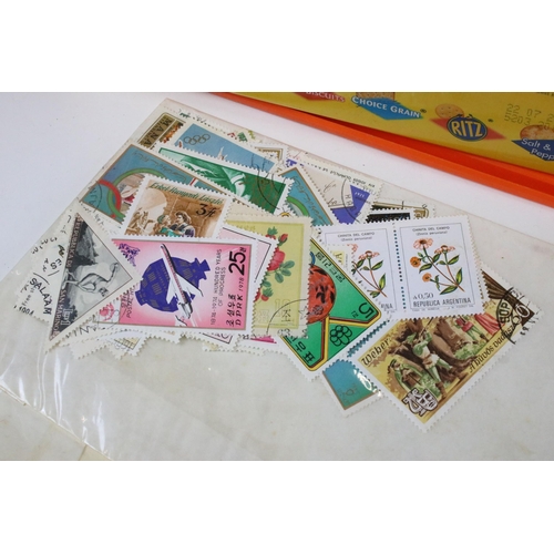 374 - Collection of assorted world stamps to include loose world kilo ware, GB stamps on mounting cards in... 