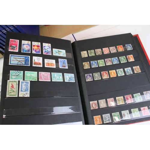 375 - Collection of stamps presented across 14 albums to include mostly 20th Century world franked stamps,... 