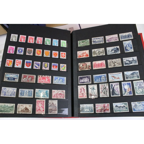 375 - Collection of stamps presented across 14 albums to include mostly 20th Century world franked stamps,... 