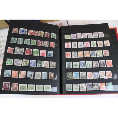 375 - Collection of stamps presented across 14 albums to include mostly 20th Century world franked stamps,... 