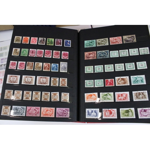 375 - Collection of stamps presented across 14 albums to include mostly 20th Century world franked stamps,... 