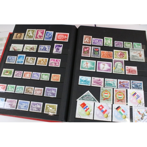 375 - Collection of stamps presented across 14 albums to include mostly 20th Century world franked stamps,... 