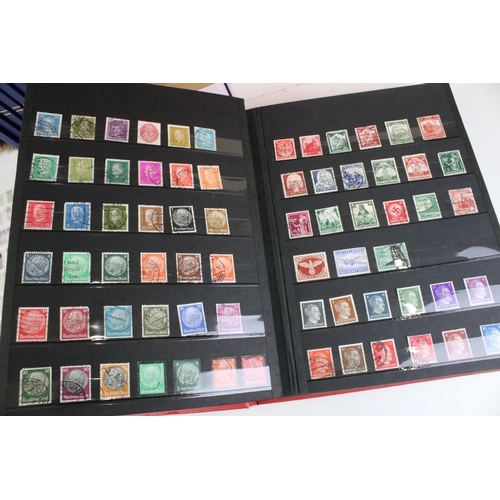 375 - Collection of stamps presented across 14 albums to include mostly 20th Century world franked stamps,... 