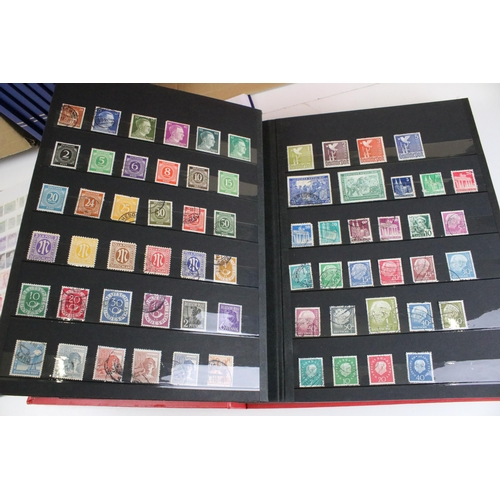 375 - Collection of stamps presented across 14 albums to include mostly 20th Century world franked stamps,... 