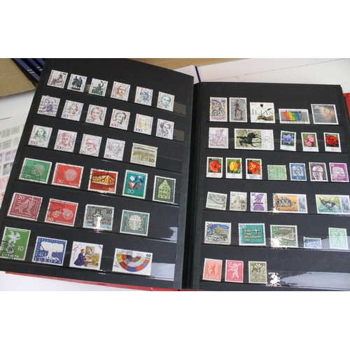 375 - Collection of stamps presented across 14 albums to include mostly 20th Century world franked stamps,... 