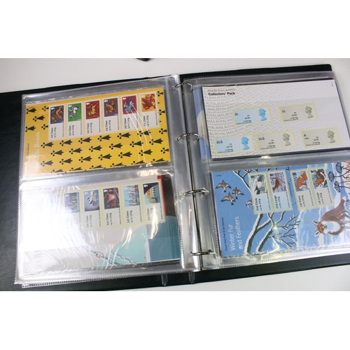 376 - Large collection of mostly recent presentation mint stamps to include approximately presentation pac... 