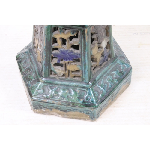 450 - Chinese glazed stoneware jardiniere stand with openwork decoration on hexagonal base with circular t... 