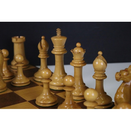 180 - A vintage Staunton chess set within wooden box together with wooden chess board. king stands approx ... 