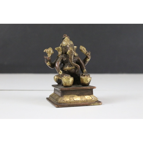 331 - Set of six Indian cast brass Ganesha figurines modelled playing instruments raised on square plinth ... 