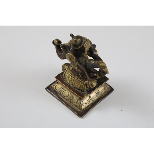 331 - Set of six Indian cast brass Ganesha figurines modelled playing instruments raised on square plinth ... 