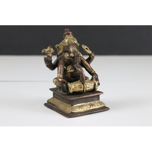 331 - Set of six Indian cast brass Ganesha figurines modelled playing instruments raised on square plinth ... 