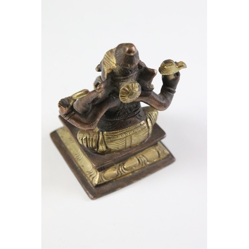 331 - Set of six Indian cast brass Ganesha figurines modelled playing instruments raised on square plinth ... 