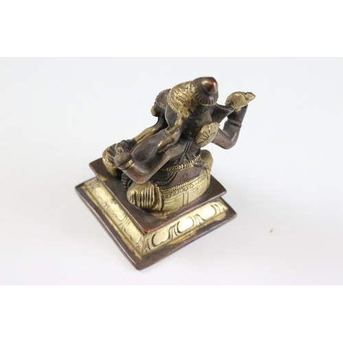 331 - Set of six Indian cast brass Ganesha figurines modelled playing instruments raised on square plinth ... 