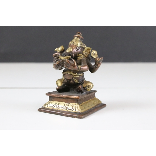 331 - Set of six Indian cast brass Ganesha figurines modelled playing instruments raised on square plinth ... 