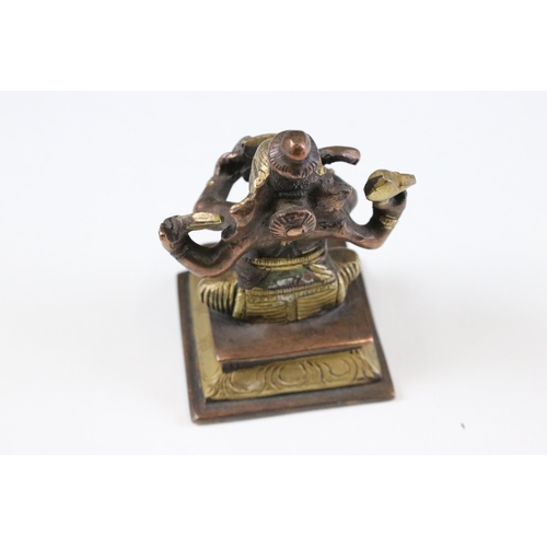 331 - Set of six Indian cast brass Ganesha figurines modelled playing instruments raised on square plinth ... 