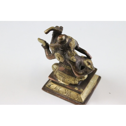 331 - Set of six Indian cast brass Ganesha figurines modelled playing instruments raised on square plinth ... 