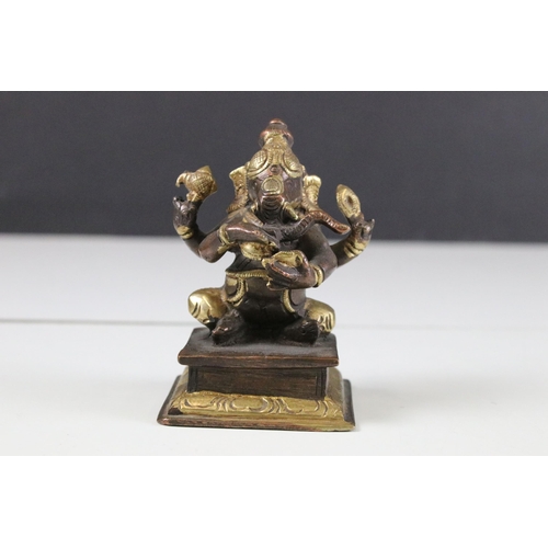 331 - Set of six Indian cast brass Ganesha figurines modelled playing instruments raised on square plinth ... 