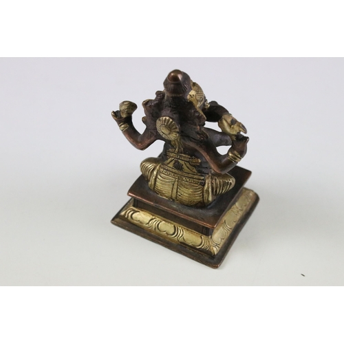 331 - Set of six Indian cast brass Ganesha figurines modelled playing instruments raised on square plinth ... 