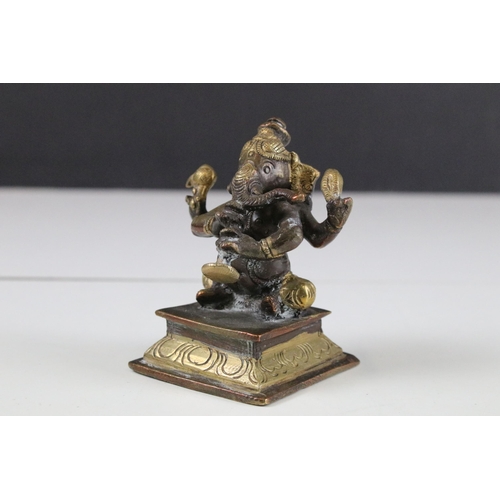 331 - Set of six Indian cast brass Ganesha figurines modelled playing instruments raised on square plinth ... 