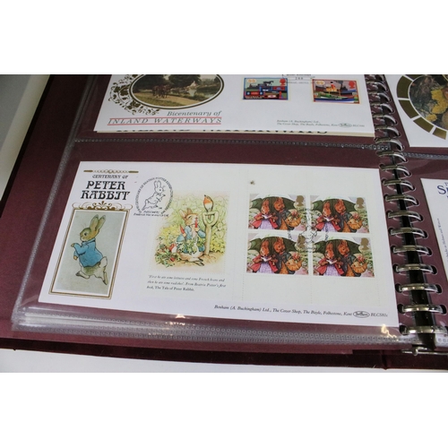 353 - Collection of first day cover stamps across five albums covering a wide range of subjects together w... 