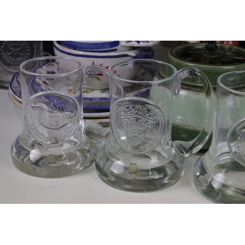 87 - Large collection of commemorative flat bottom glass tankard mugs to include Dartington crystal examp... 