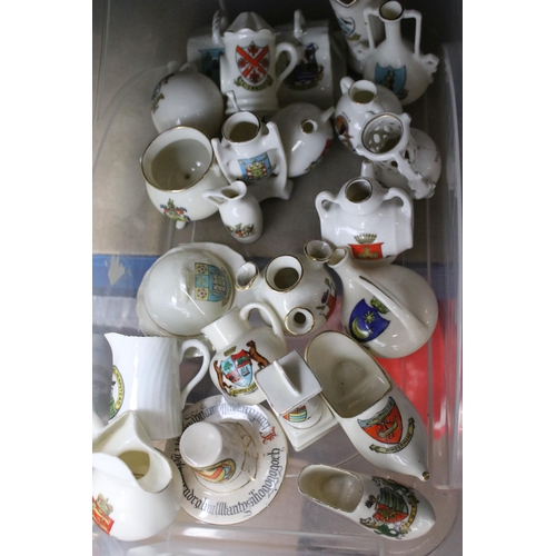 93 - A large selection of crested ware to include Exeter, Southend on Sea, Norwich and Dover examples (3 ... 