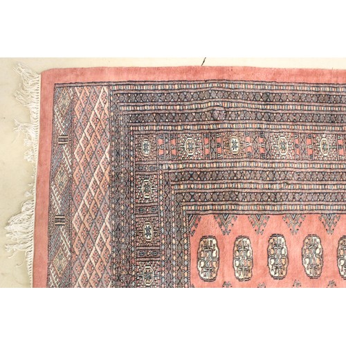 644 - Large Middle Eastern carpet rug having a red ground with medallions to central panel with blue and c... 