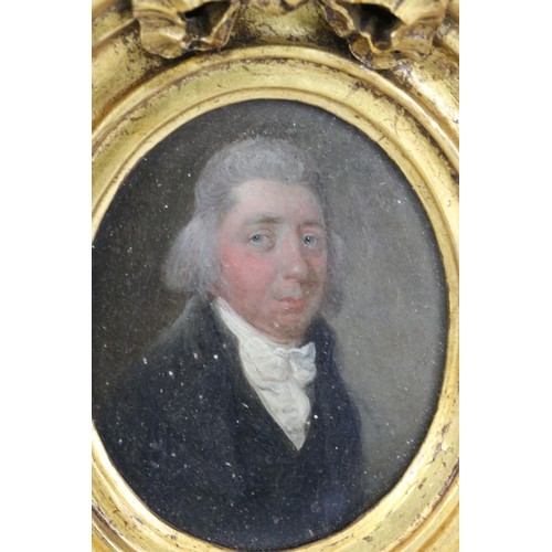 259 - 19th century English school, head and shoulders portrait of a genteman, oil on board, 9.5 x 7.5cm to... 