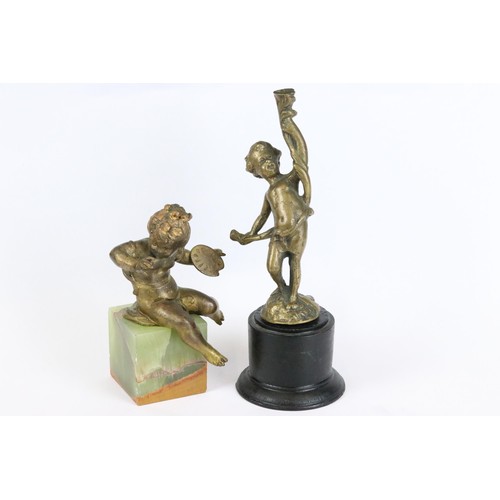 274 - Gilt metal figure of a putti holding an artist's palette, mounted to onyx base, 11.5cm high together... 