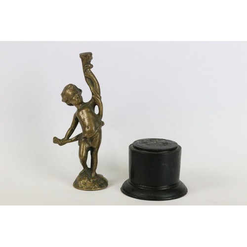 274 - Gilt metal figure of a putti holding an artist's palette, mounted to onyx base, 11.5cm high together... 