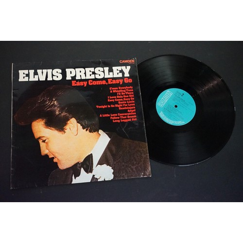 356 - Collection of Elvis Presley related collectables to include a selection of pin badges, three LP's an... 