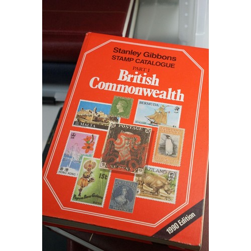 364 - Collection of British commonwealth stamps across four albums which appear mostly complete, countries... 