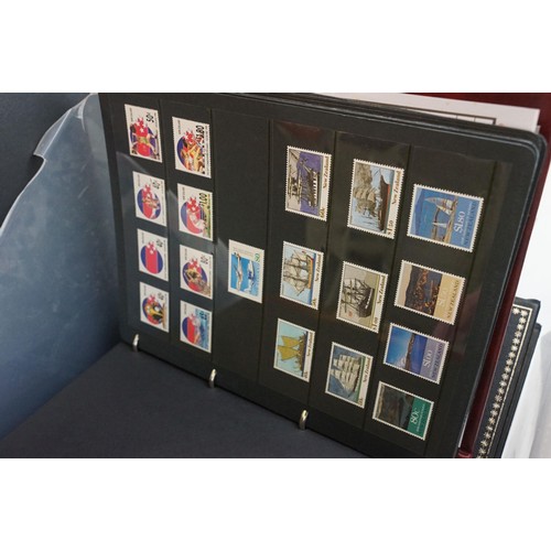 365 - Collection of world and commonwealth stamps across nine albums dating from the 19th Century onwards ... 