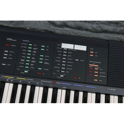 455 - Yamaha PSR-70 piano keyboard set within a fitted case.