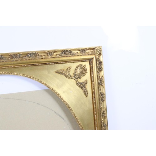 545 - 20th century gilt frame, oval inset within rectangular foliate border, 120 x 91.5cm